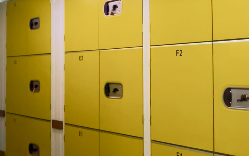 Secure yellow lockers for personal storage.